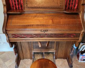 This is a fantastic Antique Pump Organ with Stool by Clough & Warren Company 
 