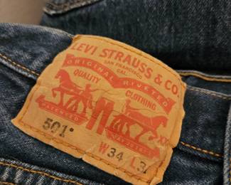 Several 501 Levi Strauss Jeans. 