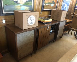 Record cabinet with speakers, stereo, and record player