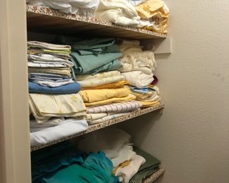 Full linen closet with new and retro styles