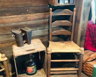 Many hand made hide bottom chairs
Vintage HN Randolph box
Vintage beehive smoker metal can leather billows
Vintage bottles