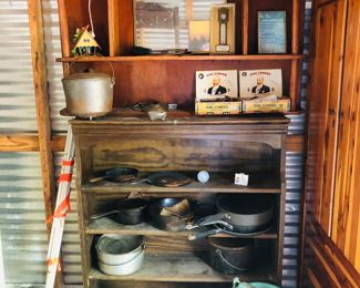 2 sets of shelves stacked, cast iron, gas can, enamelware, etc…