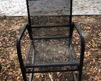 Pair of black expanded metal patio chairs 
