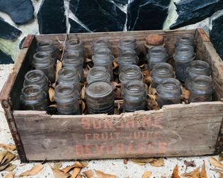 Milk crate full of milk bottles 