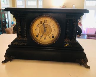 
The circa 1900-1910 E. Ingraham "Adrian" model with marbleized wood and brass mounts with key.