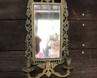 Brass mirrored wall sconce