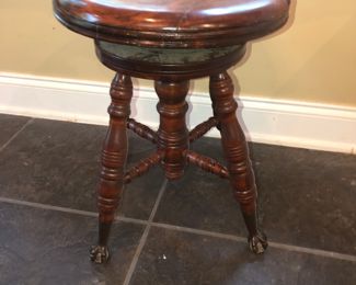 Mahogany piano stool with ball and claw feet