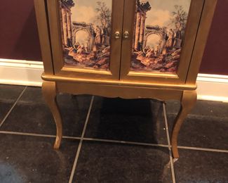 Gilded salon cabinet with Roman ruins scenes on the doors