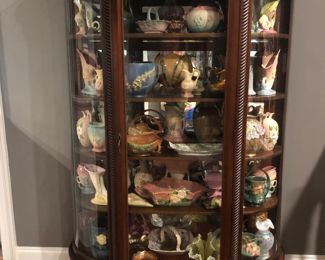 Antique curved glass claw foot china cabinet with carved roping 