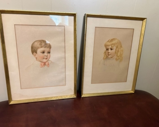 #45 Set of 2 framed  boy/girl artwork 14x18  $20