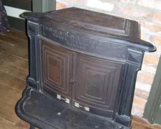 MASTER BEDROOM ANTIQUE CAST IRON WOOD BURNING STOVE BY INTL. PRATT, WEEKS & CO., BARTON, PA.