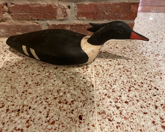 $50. Handmade reproduction of an antique Duck decoy from the early 1900s - image of the Common Merganser. 19"Lx6"Hx6"w.  Signed on bottom by the artist. 