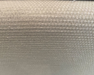 Close up of fabric. Bed has been used for 15 years, so upholstery needs cleaning or replacement, which is why the price is so low.