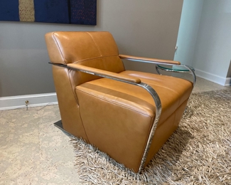 $800. Leather and chrome lounge chair. 27"wx36"dx29"H. Seat height is 16.5" from ground. Seat depth 23".