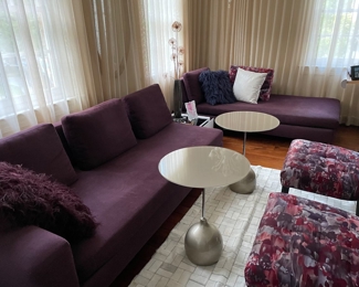 $2,050. Calligaris Modern Italian sofa set: left one-arm sofa + Chaise in eggplant fabric. Can be connected as an L, or used separately as pictured.  For both pieces, back height is 27" from floor, seat height  is 14.5" from floor and depth is 39". One arm sofa is 86"L and (original back pillows all included; throw pillows sold separately). Seat depth is 22-29, depending on placement of back pillows.