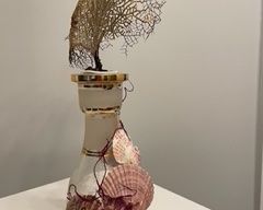 A product of NoregretsStudioDC where sunken treasures emerge with new vitality. Each item is unique and re-created by the coquille artist.
