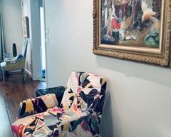 In situ. Dedication from the artist written by him to original owners on the reverse.