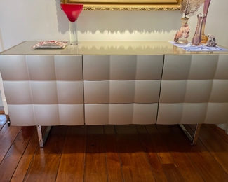 $4,650. Italian buffet "Venice" sideboard by Toni Casa - 2 doors and 3 drawers. 21.5"wx63"Lx29.5"H. Matt champagne lacquered with glass top and chrome legs (complements previous side table listing) 