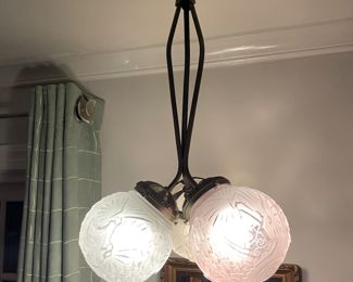 Angle view. You can find ones with single globe and even 6 globes on 1st Dibs and other high-end auction sites.