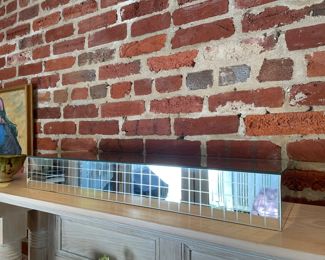 $45. Vintage mirrored box, 30"Lx9"dx4"h. 4 sides covered in mirrors (top, sides & front). Condition consistent with age -- nicks and some minor loss of mirroring at some edges.