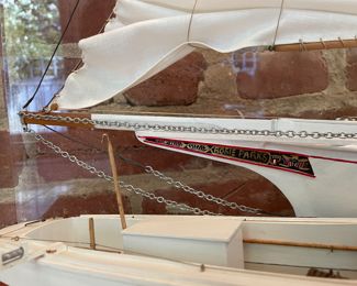 Larger boat is a model of the Skipjack "Rosie Parks." Read about her history here: https://cbmm.org/rosie-parks-skipjack-1955/