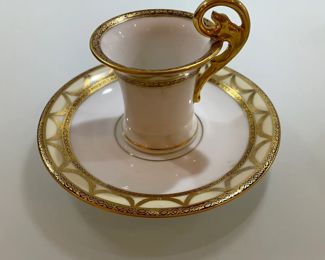 Gold handles and decorative detail are in beautiful condition