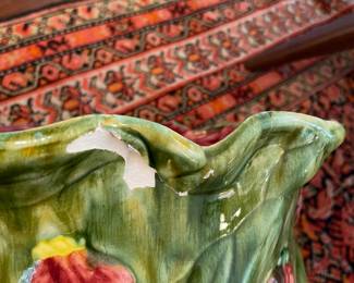 Close up of chip on one of the two planters