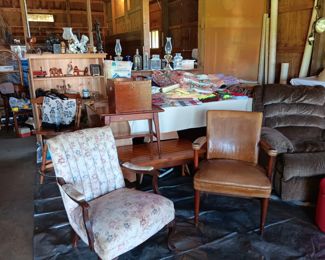 Several chairs, wooden coffee table, wooden end table 