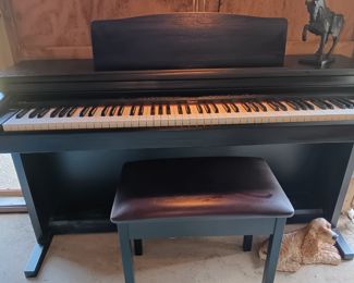 Roland HP 330 digital piano with Roland bench seat.  Excellent sound.