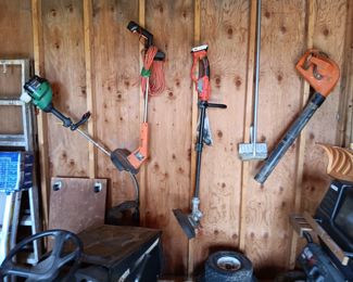 Feather Lite F220 Weed Eater, 15" cut; Black & Decker plug-in weed wacker; Black & Decker Weed Wacker with two 20V Lithium batteries and charger; Craftsman 1 HP electric Power Blower