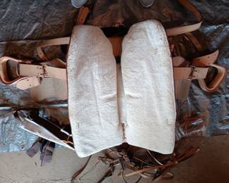 Underside of tan leather saddle