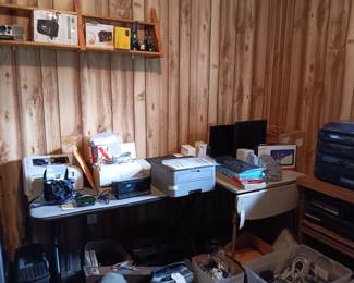 Kodak, Sony Panasonic, Pentax and Polaroid camera equipment; tri-pods; HP, Canon, and Brother printers; flat screen monitors and LED TVs