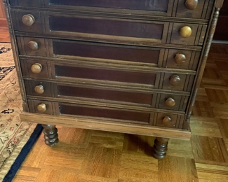 Antique spool cabinet would make a great side table or nightstand 