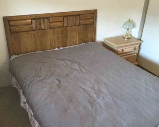 Bed And Side Table And Beautiful Lamp