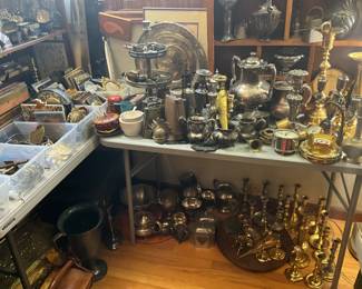 Tons of brass candlesticks