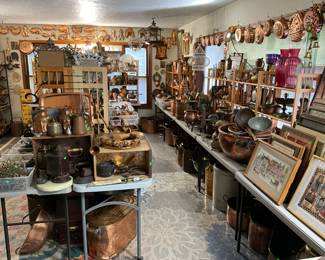 Front room dedicated mostly to copper items - moulds, basins, cauldrons..also tons of artwork