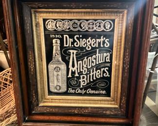 Framed antique advertising sign