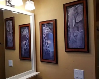 (2) R. Manning prints framed for the Safari Bathroom.