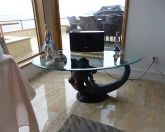 Mermaid base oval glass top cocktail table