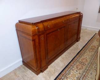 Large dining table with 10 chairs, sideboard, area rug