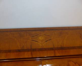 Large dining table with 10 chairs, sideboard, area rug