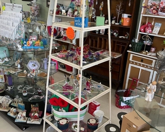 Tall metal pyramid display shelf ......