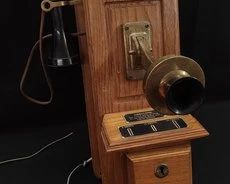 https://www.auctionninja.com/hewitt-estates-and-antiques/product/vintage-payphone-200184.html