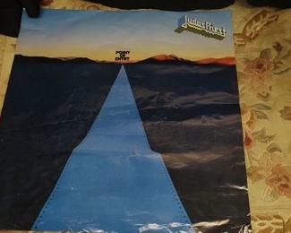 https://www.auctionninja.com/hewitt-estates-and-antiques/product/judas-priest-point-of-entry-album-poster-200165.html