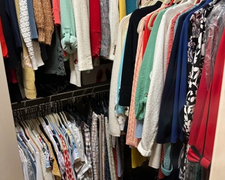 hundreds and hundreds of high end designer clothing items, many new with tags, most others worn only a time or two 