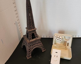 Cast iron Eiffel tower tea light candleholder and Franzus foreign power adapters