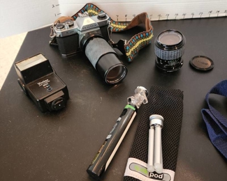 Pentax 35mm camera with macro focusing lense 70-210mm, Sigma zoom master lense 35-70mm, Vivitar flash and quick pod tripod