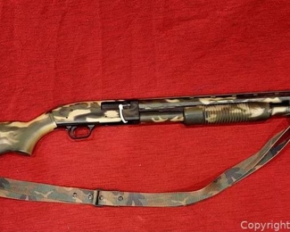 Mossberg Model 500A 12 Gauge Pump Shotgun 2 and three fourth inches and 3in Shells