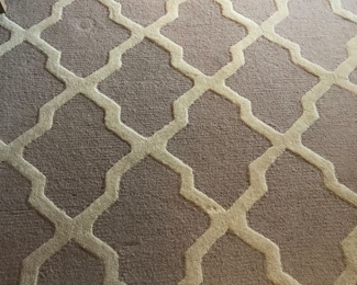 Several contemporary rugs