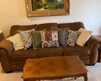 Sofa and table and paintings